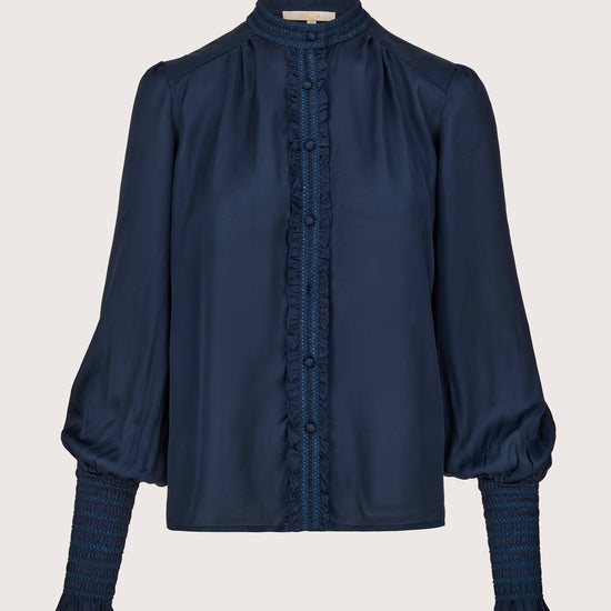 round neck navy shirt with slim cuffs and ruffle detailing from brdr