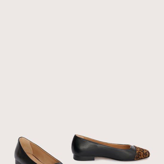 black leather pumps with animal print suede toe cap  side view