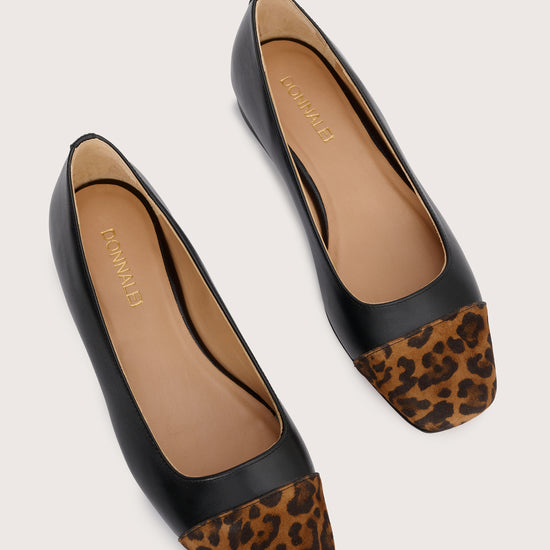 black leather pumps with animal print suede toe cap  birds eye view
