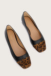 black leather pumps with animal print suede toe cap  birds eye view