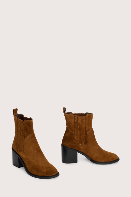 tan suede ankle boot with chunky black heel and elasticated tabs either side  side view