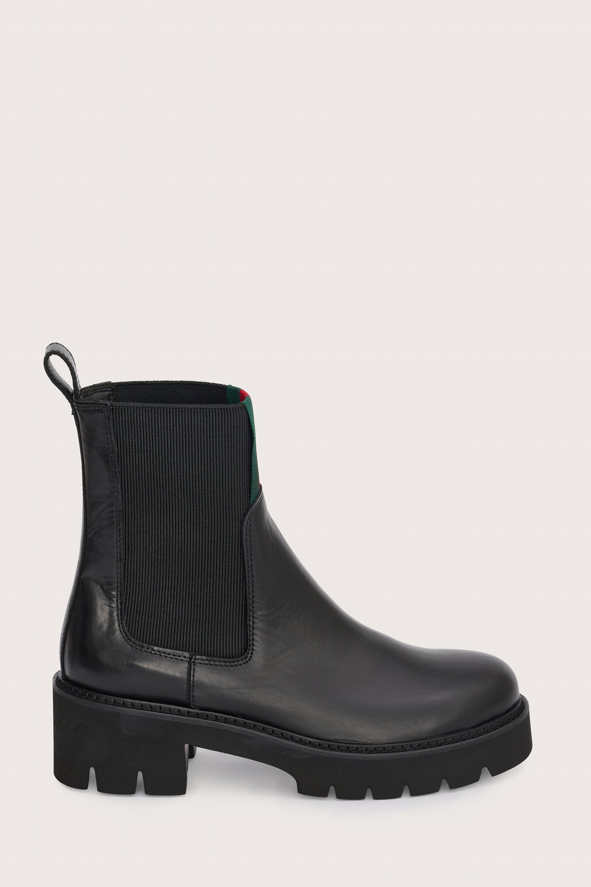 chunky black ankle boots with elasticated panels on side and red/green stripe on the front