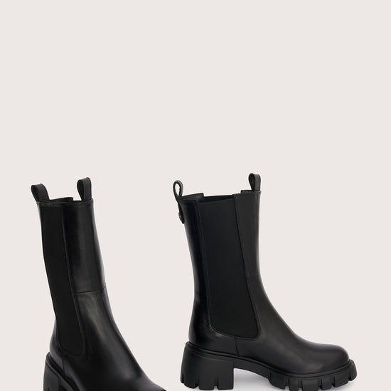 mid calf black chunky boot with elasticated side panels side view