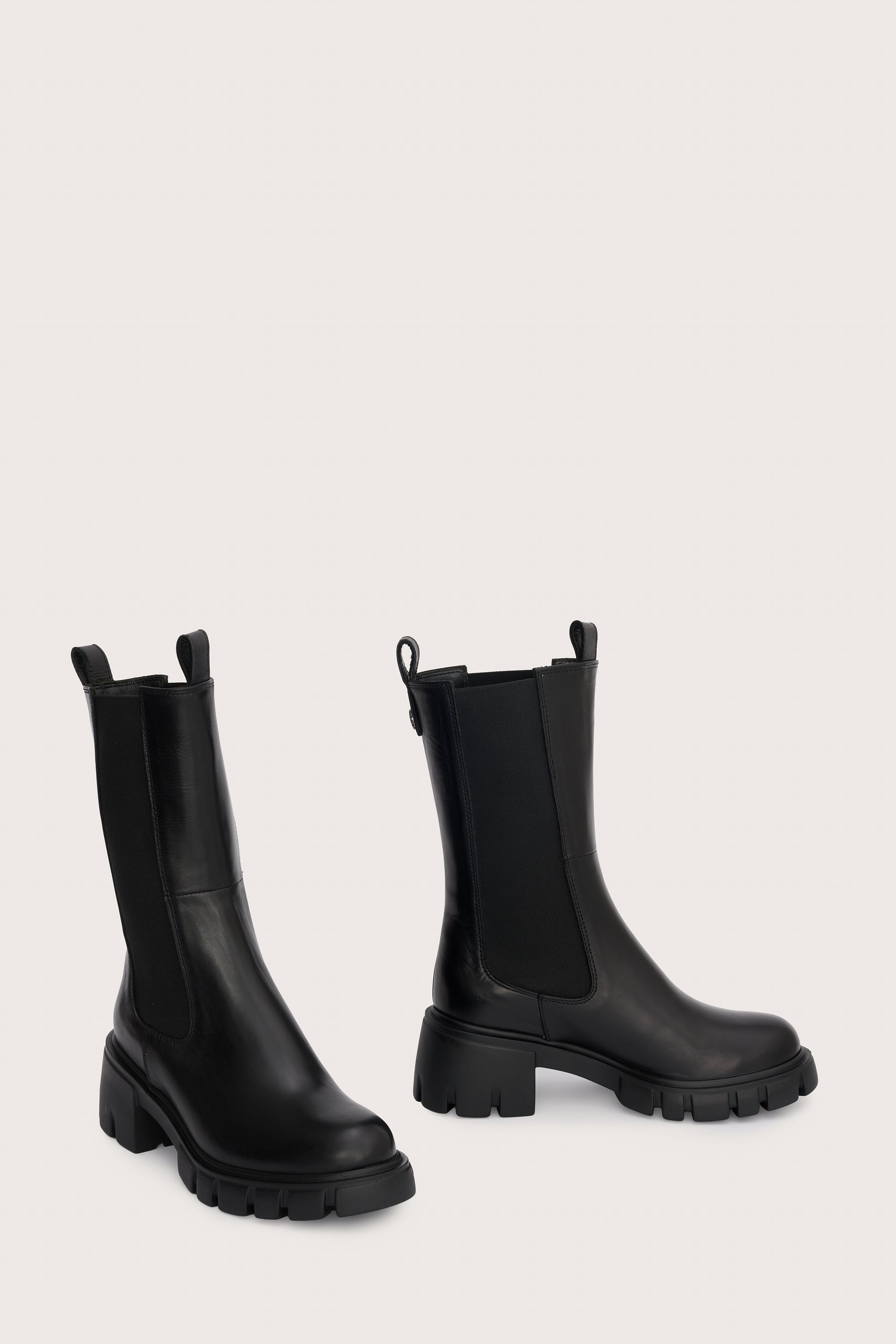 mid calf black chunky boot with elasticated side panels side view
