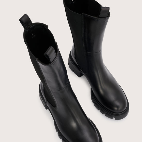 mid calf black chunky boot with elasticated side panels birds eye view