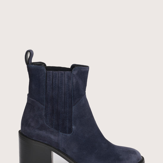 navy blue suede ankle boots with chunky black heel and elasticated tabs either side