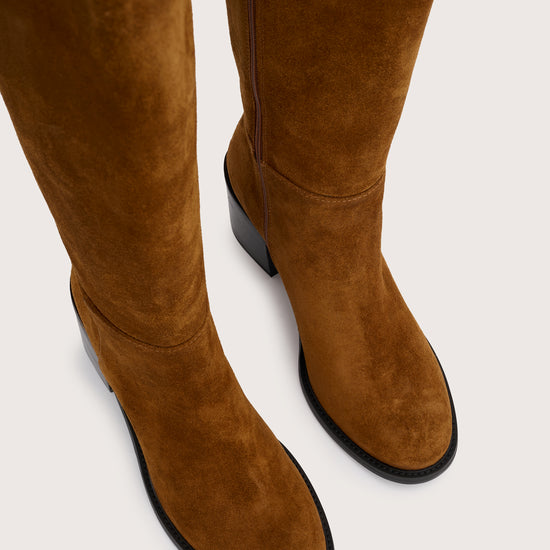 tan suede knee high boots with chunky mid black heel birds eye view 