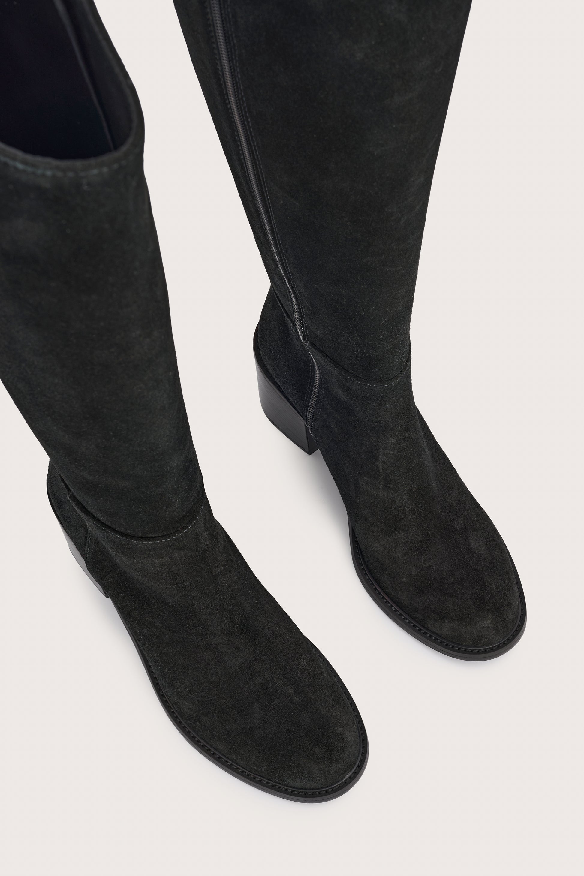 black suede high boots with chunky black heel and side zip birds eye view