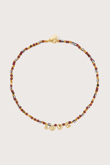 brown multi beaded choker necklace with gold love charms in the centre