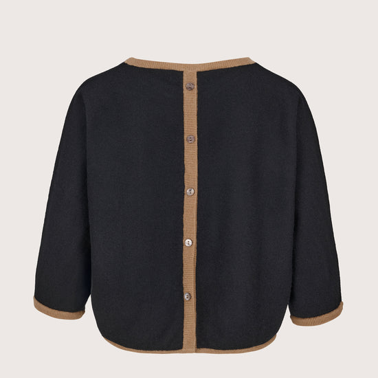 black crew neck cashmere boxy jumper with brown edging and button detailing at the rear rear view