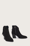 black suede western heeled ankle boot with fringe detailing and chunky heel from donna lei front view