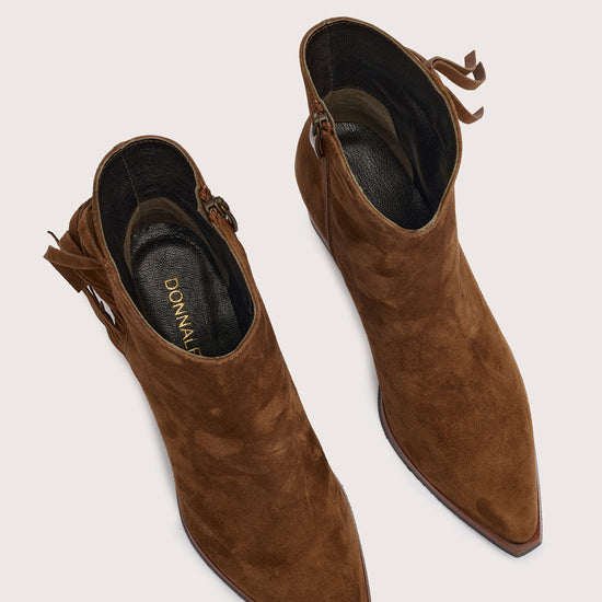 tan suede western heeled ankle boot with fringe detailing and chunky heel from donna lei birds eye view