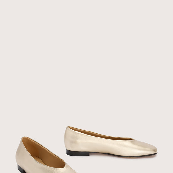pale gold leather ballet flats with v shaped toe shape