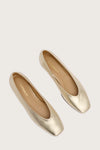 pale gold leather ballet flats with v shaped toe shape birds eye view