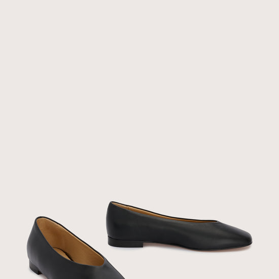 Black leather ballet flats with squared toe and v shaped toe shape from donna lei  front view