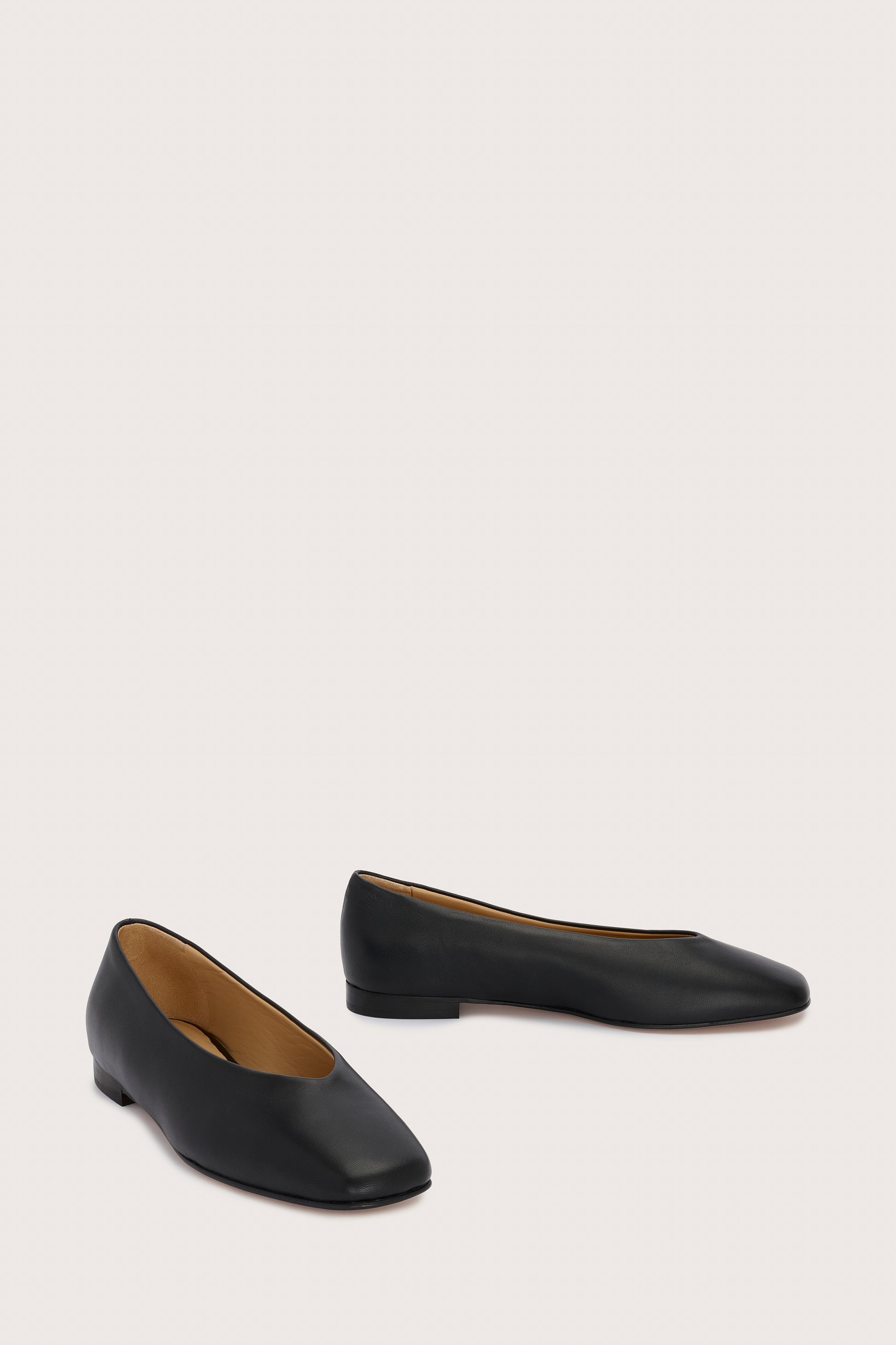 Black leather ballet flats with squared toe and v shaped toe shape from donna lei  front view