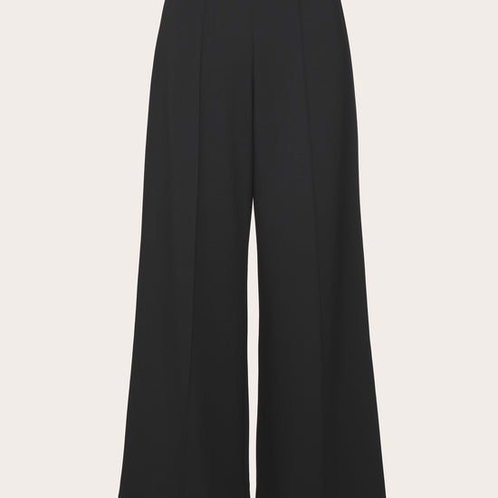 Black wide-leg cropped trousers with a high waist and front crease, shown flat on a light beige background.