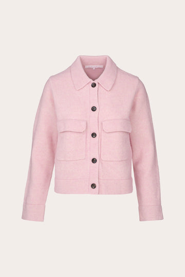 A light pink cropped jacket with a pointed collar, front button closure, and two flap pockets, shown on a plain light beige background.