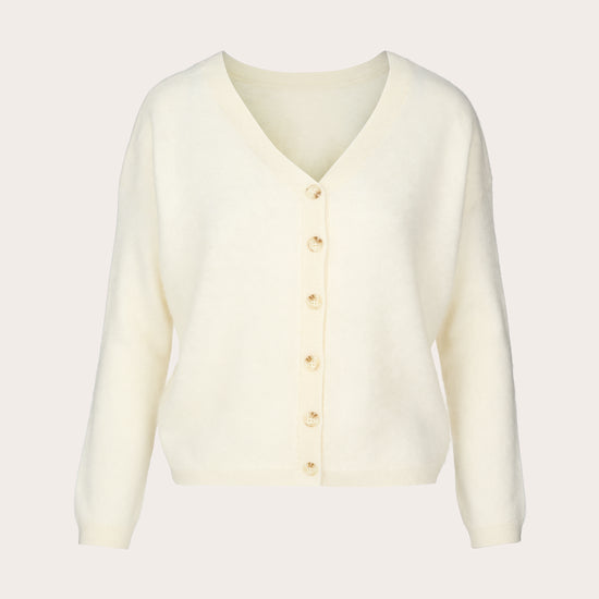 An off-white V-neck cardigan sweater with a button-up front, displayed on a clean, solid, light beige background.