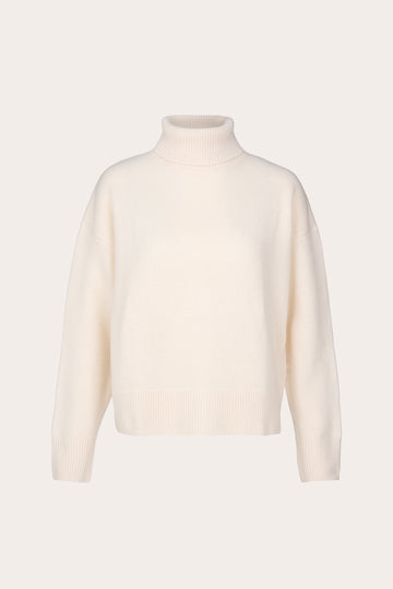 A cream-colored knit turtleneck sweater displayed on a clean, solid, very light beige background.