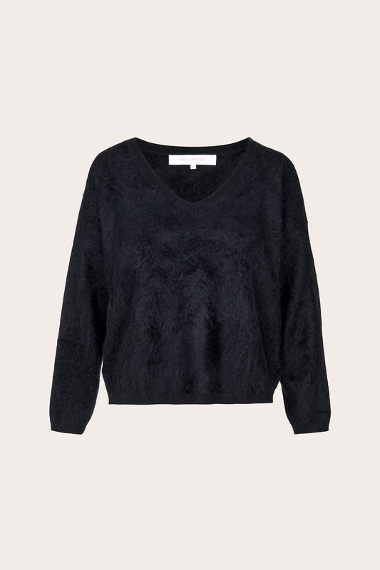 A black fuzzy long-sleeve V-neck sweater displayed flat against a light beige background.