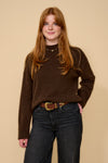 model shot wearing brown jumper black jeans and brown belt with a gold buckle