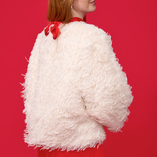 white faux fur feather effect short jacket