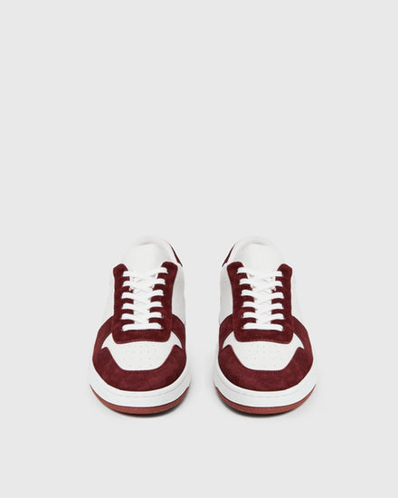 white trainers with burgundy suede  front view 