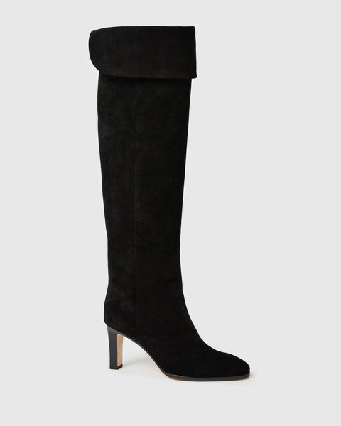 knee high heeled black suede boots side view