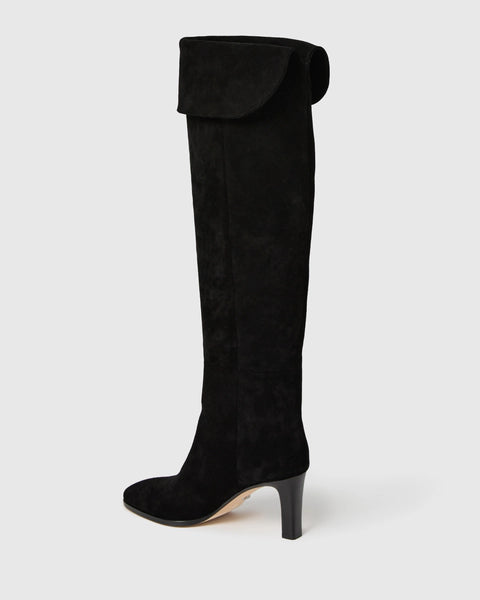 knee high heeled black suede boots rear view