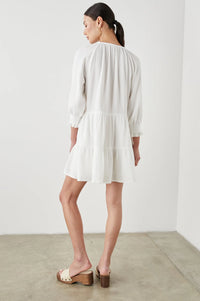 White notch neck cheesecloth dress with double tier and bracelet length sleeves with ruching detail