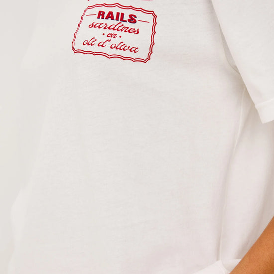 White t-shirt with red graphic design on a plain background from rails