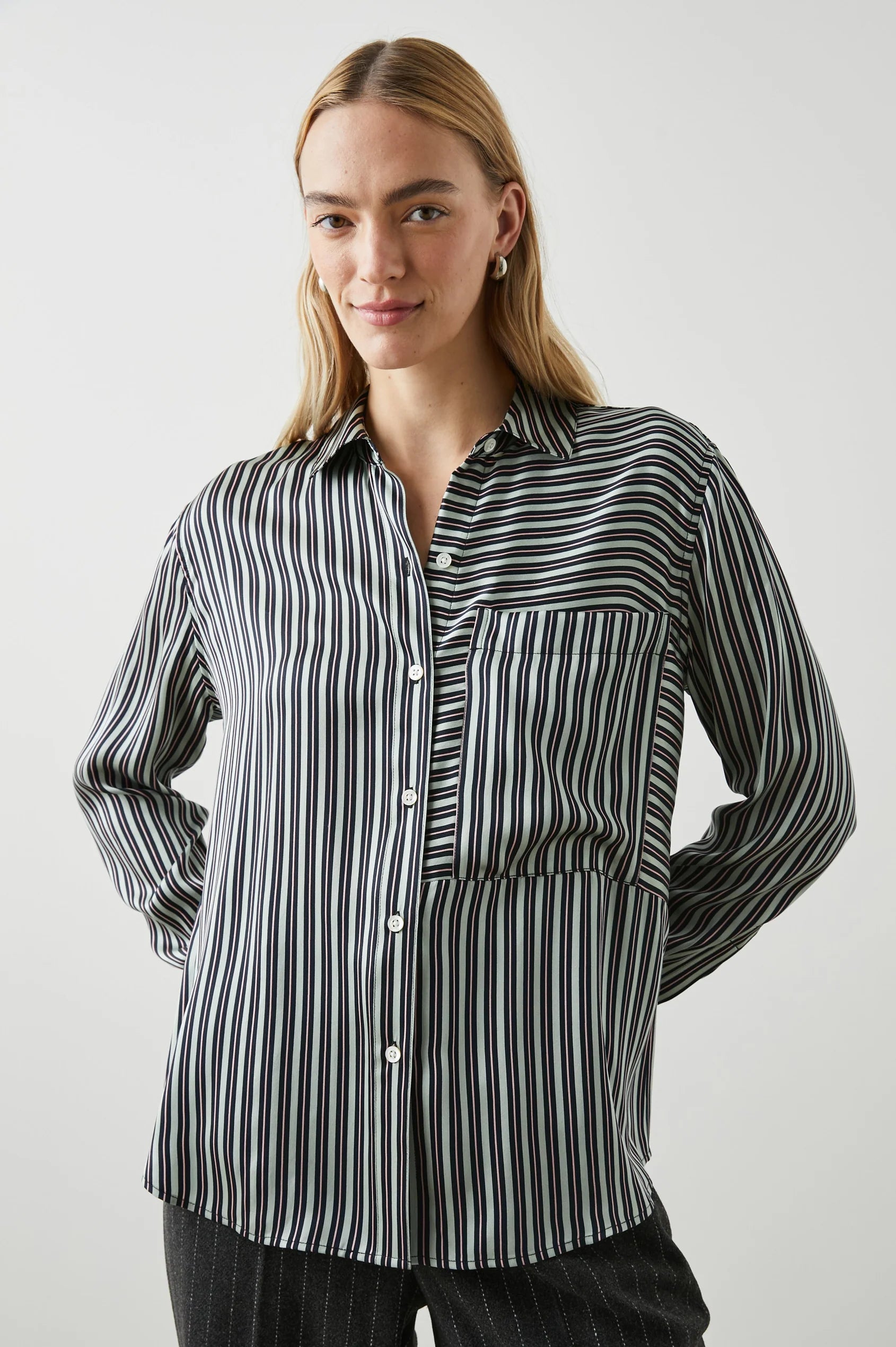 Green black and pink vertical striped silk shirt with large front patch pocket and full length plastic button fastening