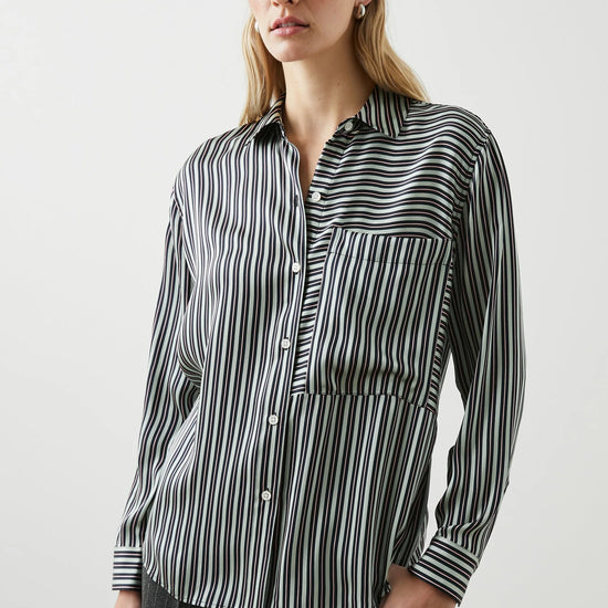 Green black and pink vertical striped silk shirt with large front patch pocket and full length plastic button fastening