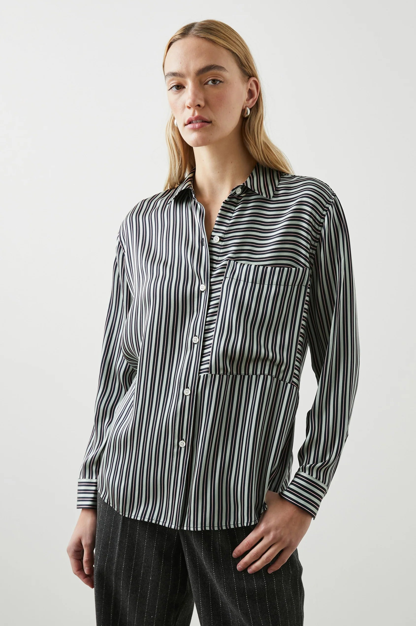 Green black and pink vertical striped silk shirt with large front patch pocket and full length plastic button fastening