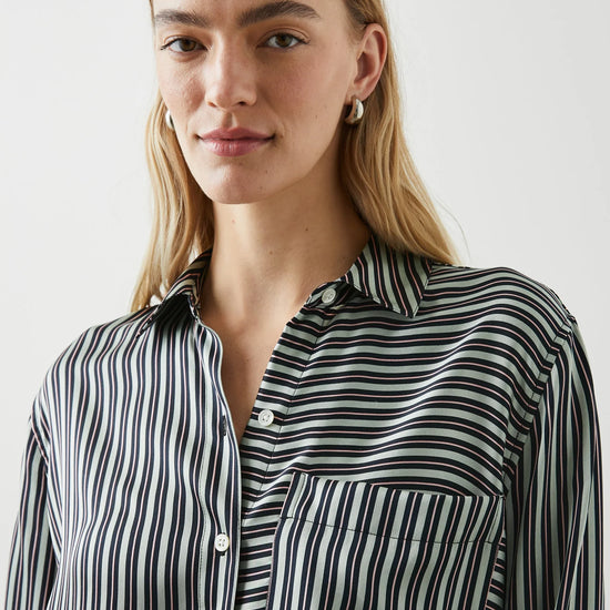 Green black and pink vertical striped silk shirt with large front patch pocket and full length plastic button fastening