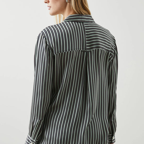 Green black and pink vertical striped silk shirt with large front patch pocket and full length plastic button fastening