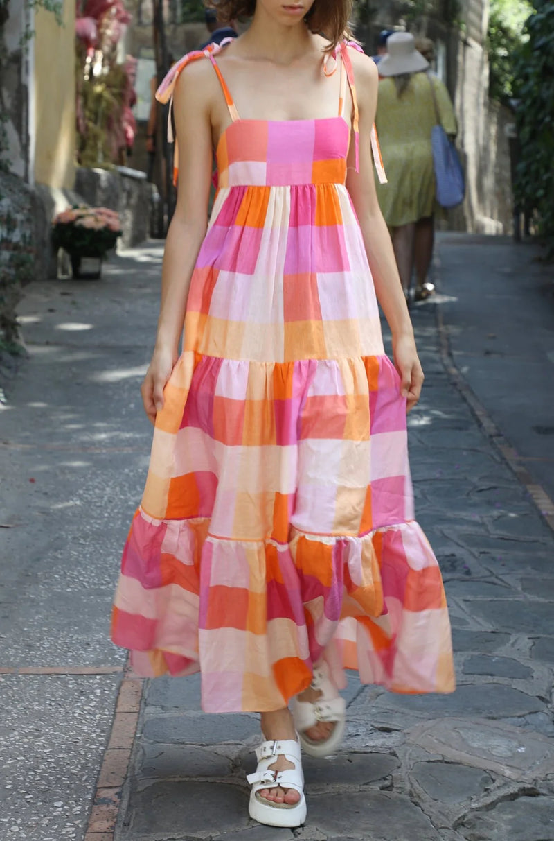 Pink and orange check linen maxi dress with three tiers fitted bodice and spaghetti straps an open back with thick tie fastening mid back