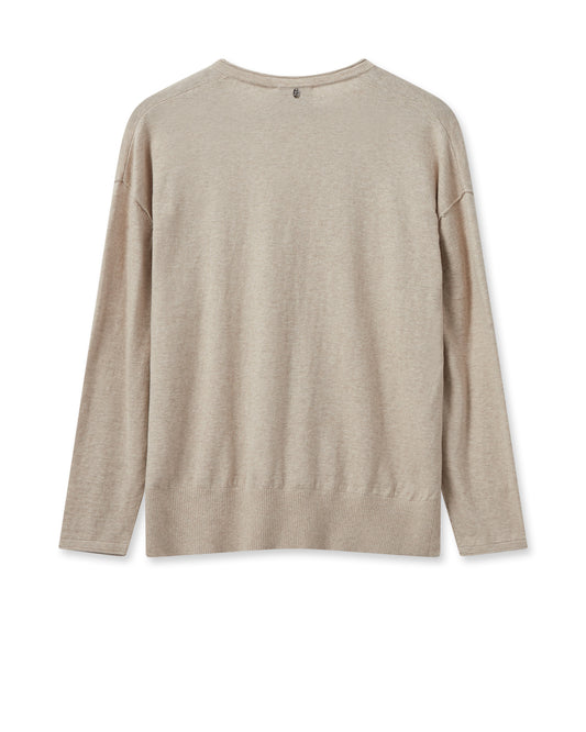 Beige V neck jumper with rolled edges and dipped hem with side splits and long sleeves