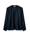 Navy semi sheer pull on top with tie neck and raglan sleeves