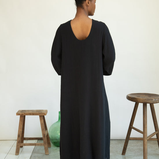 Rear view of black organic cotton dress from Beaumont Organics
