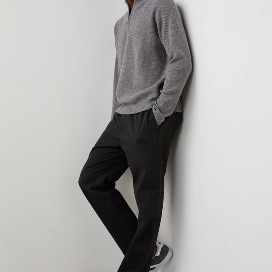 dark grey quarter zip jumper with ribbed hem, cuffs and neck