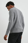 dark grey quarter zip jumper with ribbed hem, cuffs and neck rear view