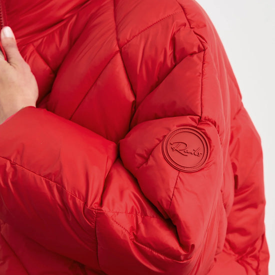 cropped red puffer jacket close up