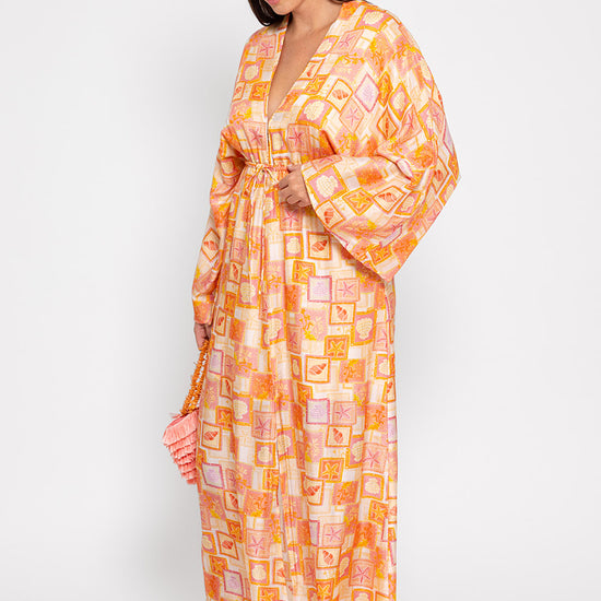 Kimono style beach print dress with a V neck and drawstring waist