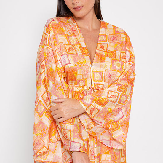 Kimono style beach print dress with a V neck and drawstring waist