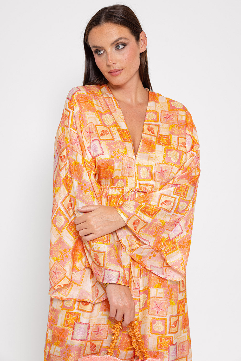 Kimono style beach print dress with a V neck and drawstring waist