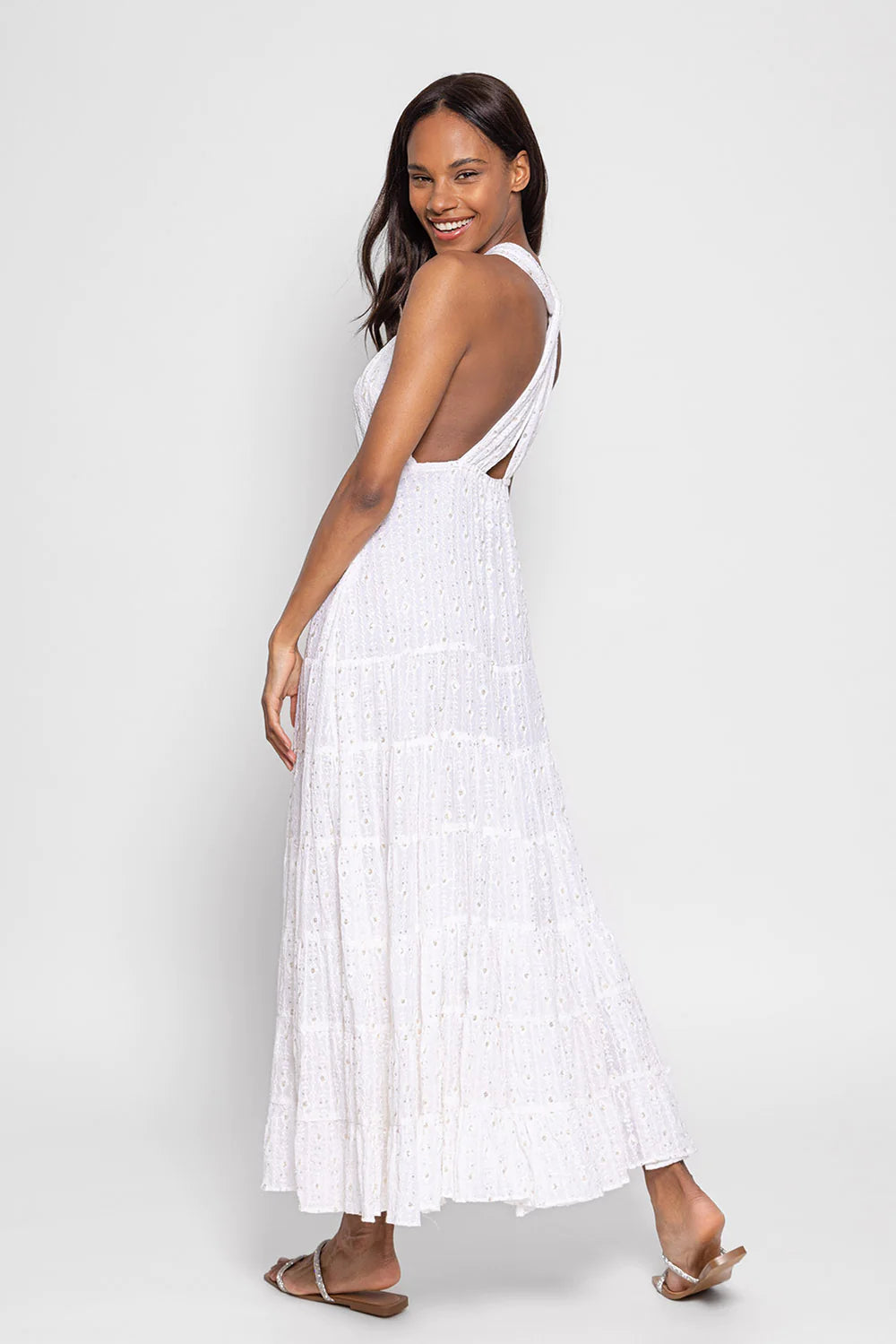 White embroidered cross front and knot back maxi dress with multiple tiers and tiny sequin details