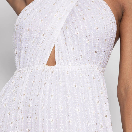 White embroidered cross front and knot back maxi dress with multiple tiers and tiny sequin details