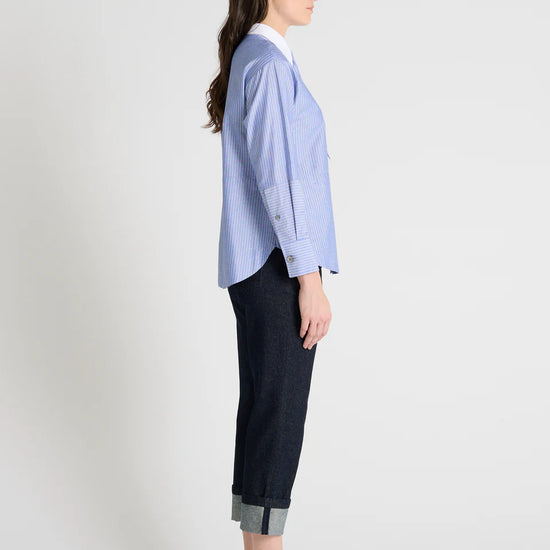 blue pinstripe shirt with a tie and contrasting white collar side view